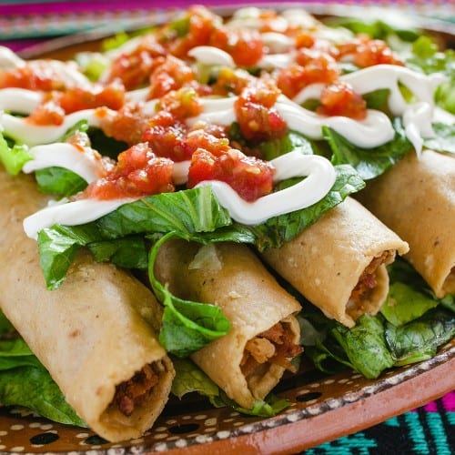 Rolled Tacos, Guacamole & Cheese.